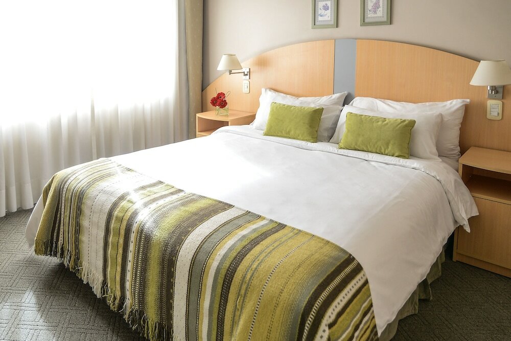 Фото Portal Plaza Suites