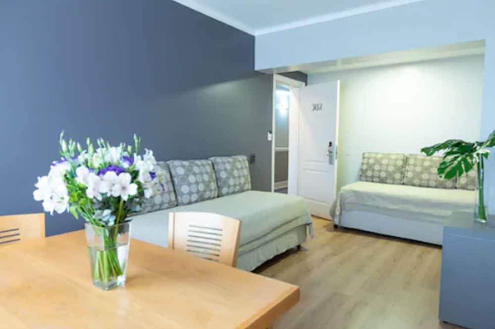 Фото Portal Plaza Suites