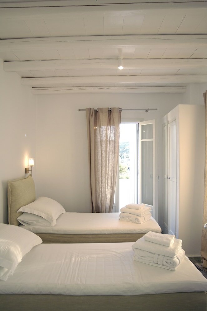 Фото Kapetan Tasos Suites