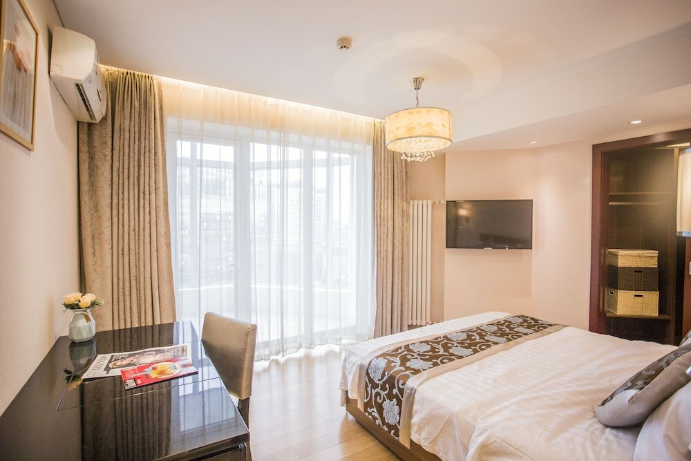 Фото Beijing Guangyao Service Apartment Chaoyangmen