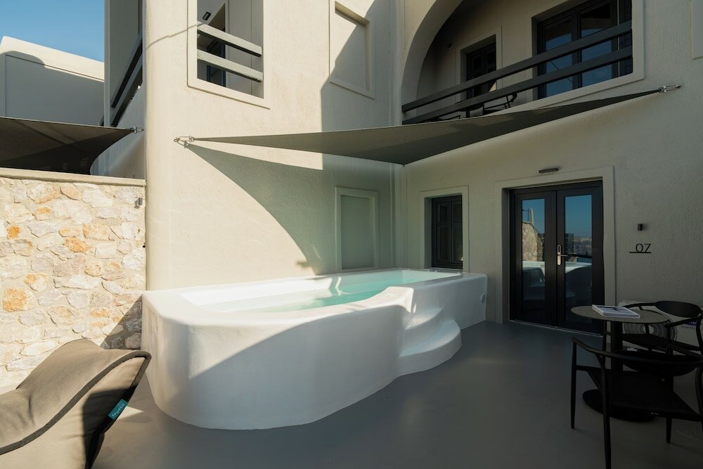 Фото Black Diamond Suites - Adults Only