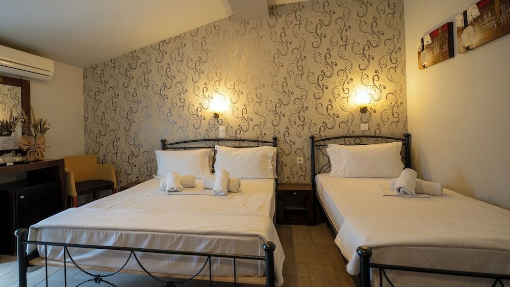 Фото Toti Boutique Rooms