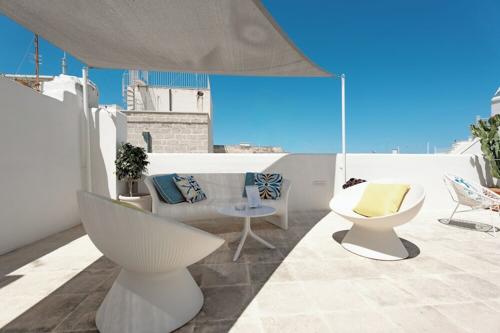 Фото Donna Domenica Boutique Suites