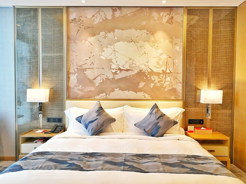 Фото Ramada Plaza Dongxing City Center