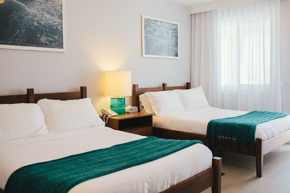 Фото Tides Inn Hotel