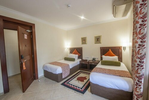 Гостиница The African Tulip Hotel в Аруше