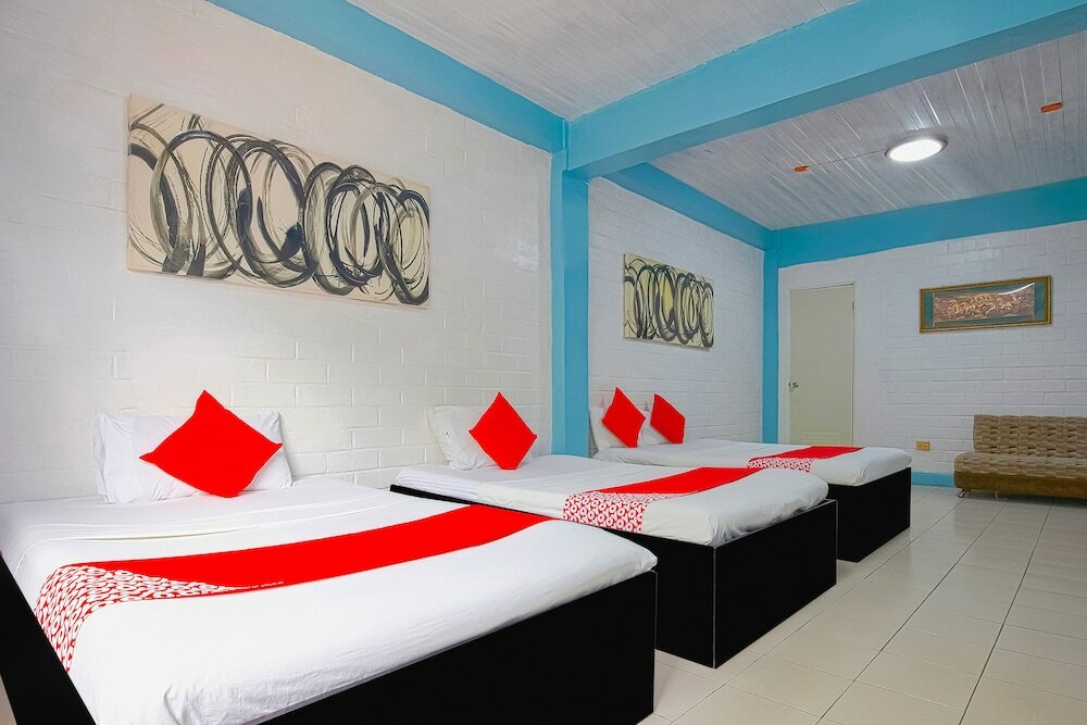 Фото Oyo 749 La Maria Pension And Tourist Inn Hotel