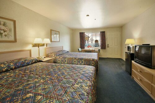 Внешний вид отеля Days Inn by Wyndham Riverside Tyler Mall в Риверсайде, фото 5