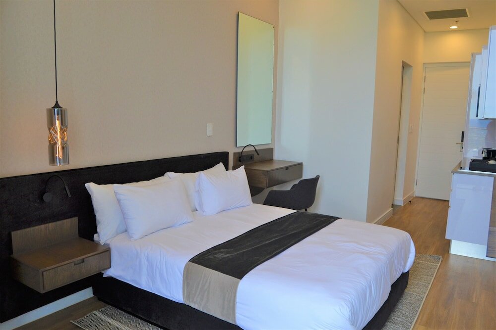 Фото Reserved Suites Illovo
