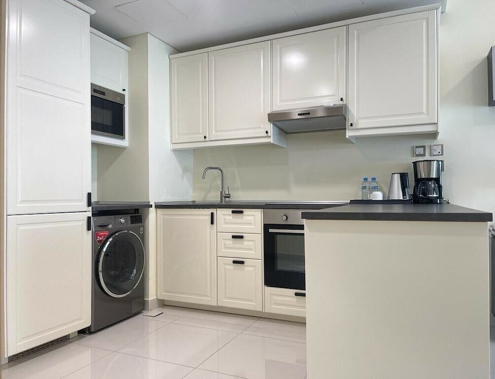 Фото Al Manzil Residence & Suites