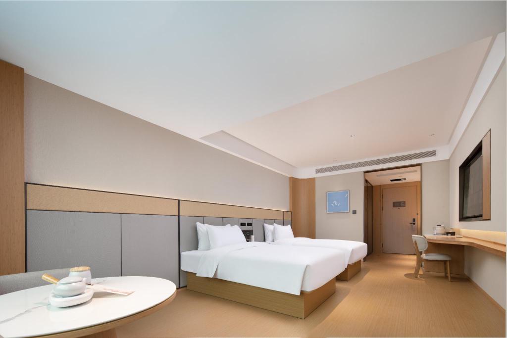 Фото Vienna Chongqing Yuanjiagang Subway Station Branch