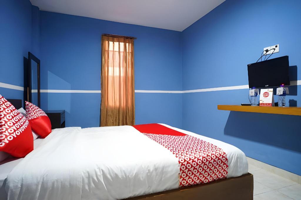 Фото Oyo 1272 Grand Garuda Guest House