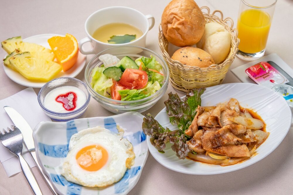 Фото Kochi Sunrise Hotel