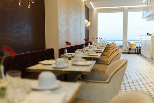 Гостиница Hotel Merveilleux Côté Mer в Кудекерк-Бранше
