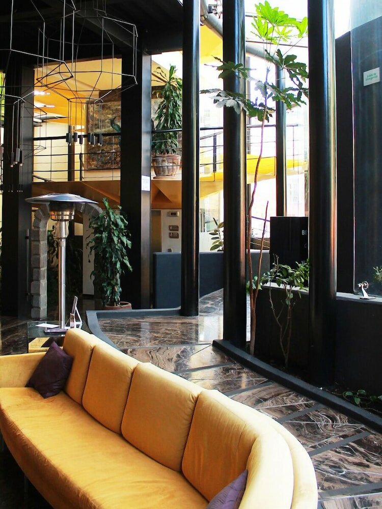 Фото Ikonik Hotel Puebla