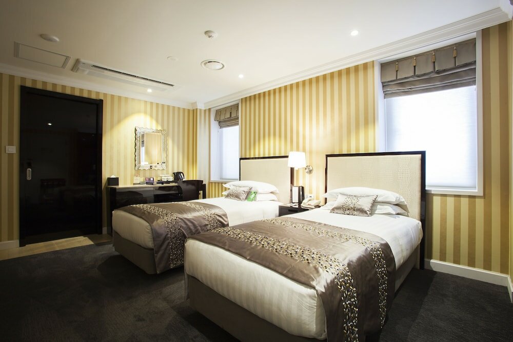 Фото The Grand Hotel Myeongdong