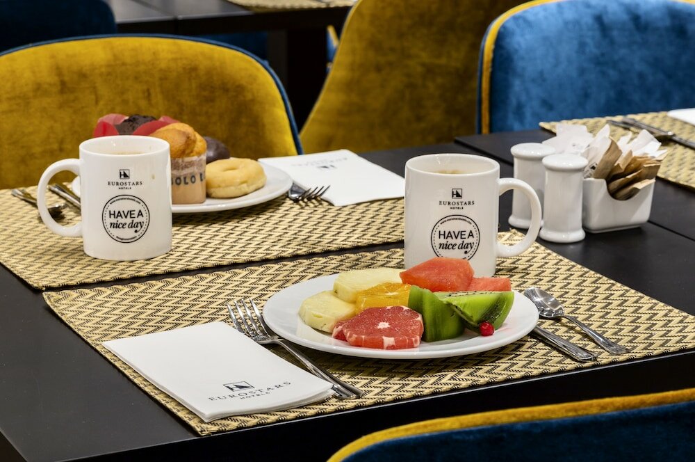 Фото Eurostars Puerta Real Hotel