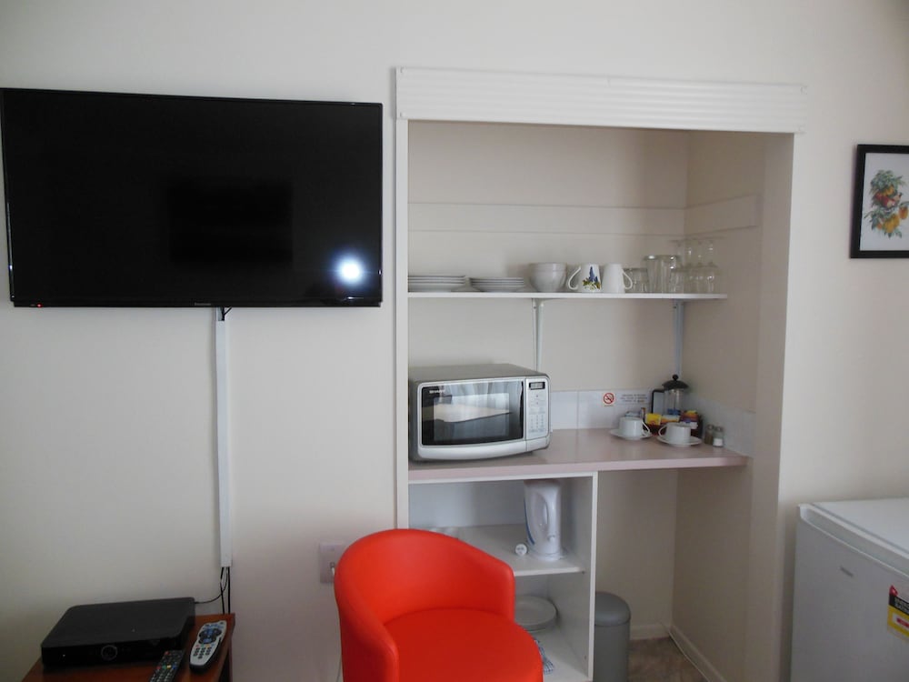 Фото Asure Camelot Arms Motor Lodge