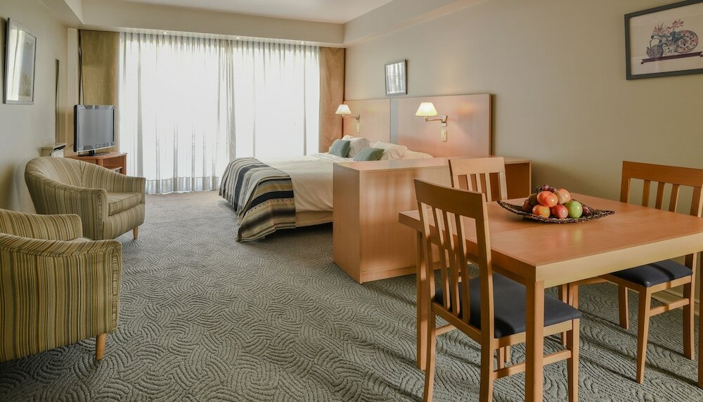 Фото Portal Plaza Suites