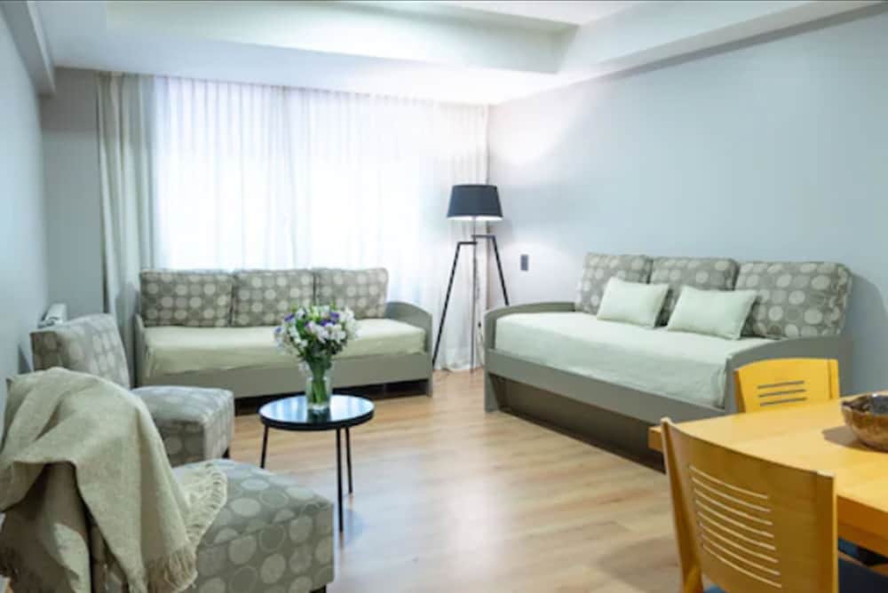 Фото Portal Plaza Suites