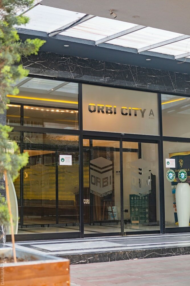 Фото Orbi City Hotel