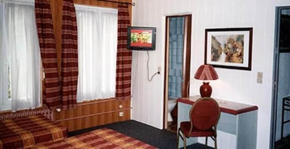 Фото Hôtel Beauséjour