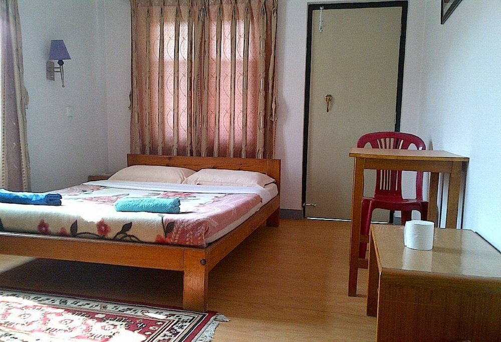 Фото Le Rhododendron Chambres D'hotes