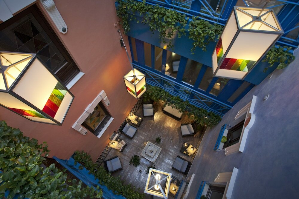 Фото Suites Gran VIA 44 Apartahotel