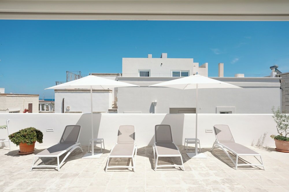 Фото Donna Domenica Boutique Suites