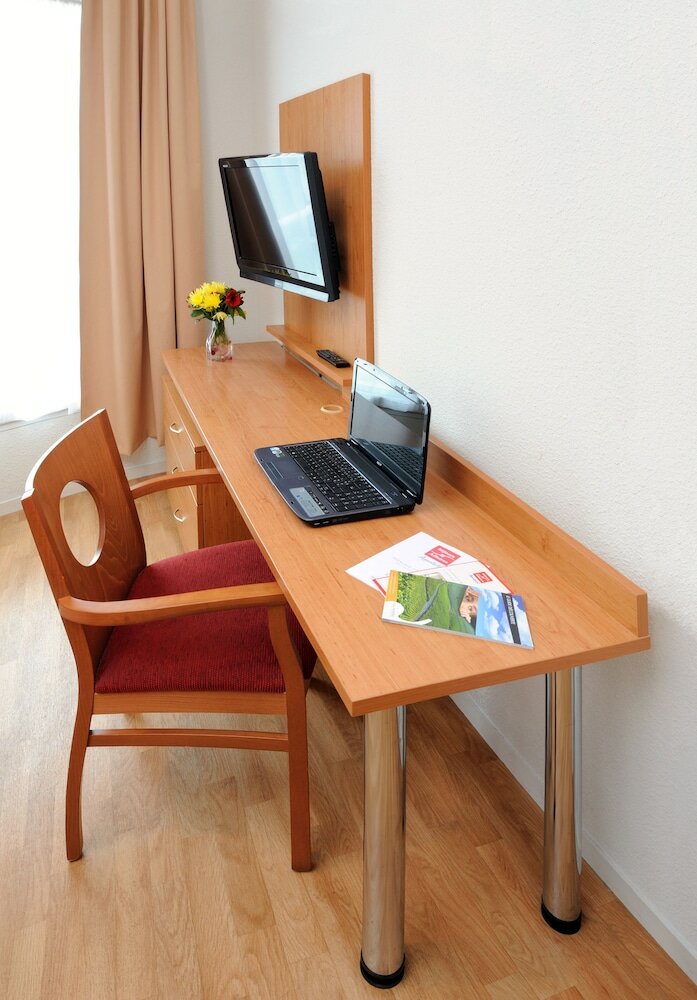 Фото Séjours & Affaires Reims Clairmarais