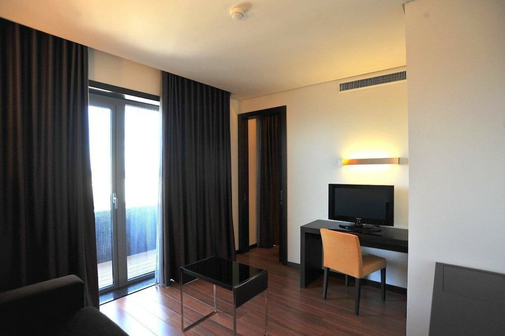 Фото Axis Porto Business & SPA Hotel