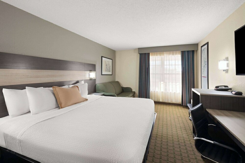 Фото Travelodge by Wyndham Perry Ga