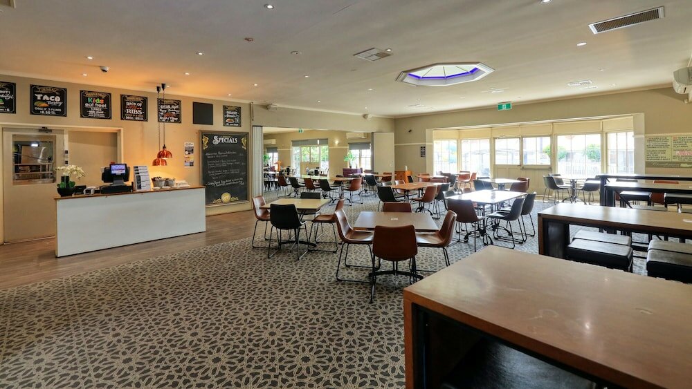 Фото Coachman Hotel Motel