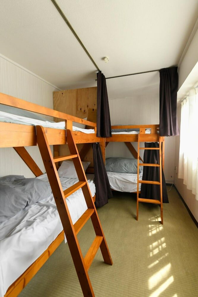 Фото Kagoshima Guest House M104 - Hostel