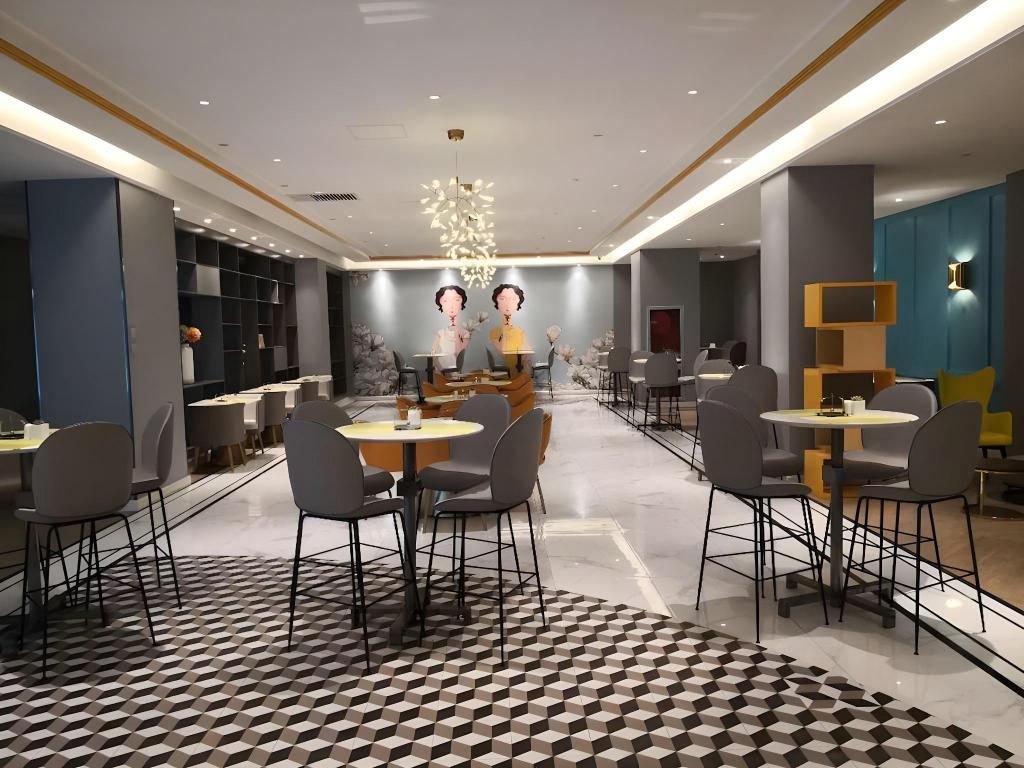 Фото Magnotel Jining Jiaxiang, Zengzi Avenue Hotel