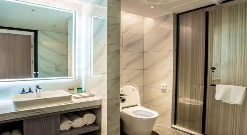 Фото Microtel by Wyndham Qingdao Huangdao