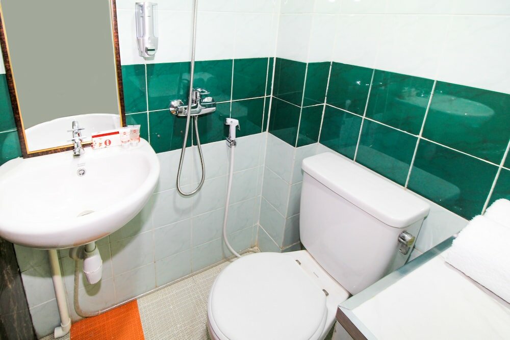 Фото Oyo 217 A1 Hotel