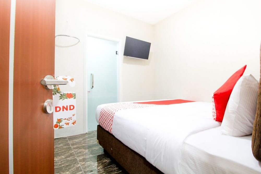 Фото Oyo 217 A1 Hotel