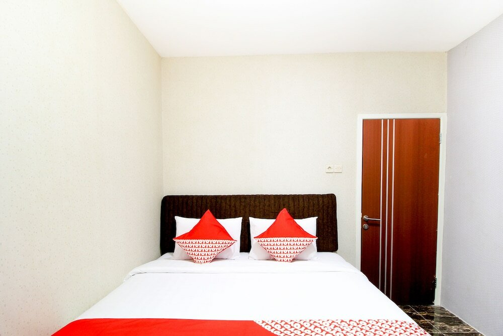 Фото Oyo 217 A1 Hotel