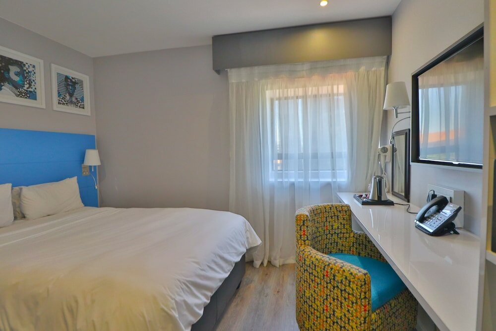 Фото Signature Lux Hotel, by Onomo