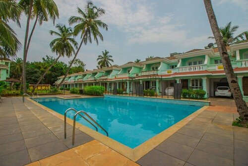 Гостиница Tripthrill CD Zen Gardens by Oyo Rooms в Бенаулиме