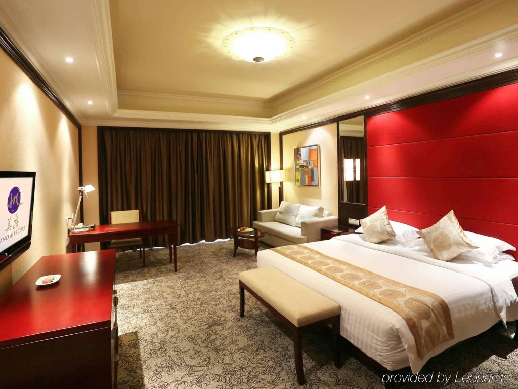 Фото Qingdao Kuaitong International Hotel