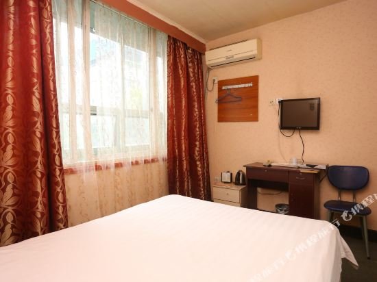 Фото Zhengfu Caotang Decent Inn