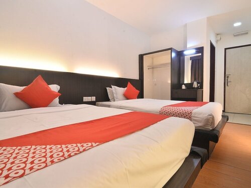 Гостиница Oyo 43960 Laksamana Executive & Boutique Hotel в Тавау