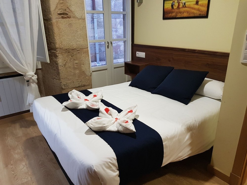 Фото Oxford Suites Santiago de Compostela