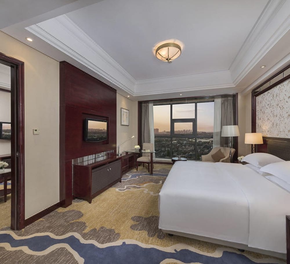 Фото Maison New Century Hotel Cixi