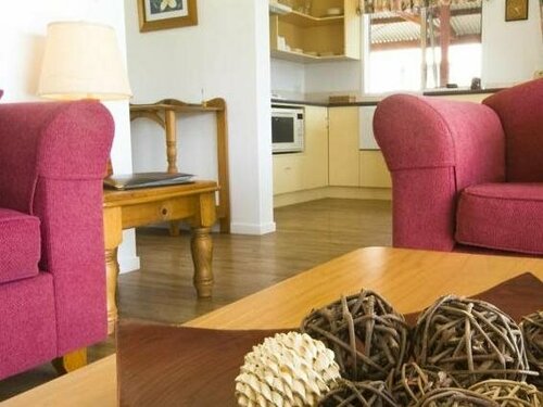 Гостиница Poinciana Cottages в Кингстоне
