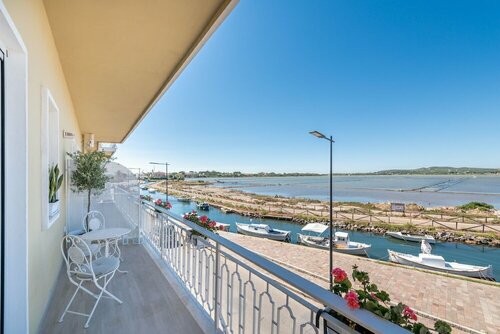 Гостиница Aquamadre Suites в Карлофорте