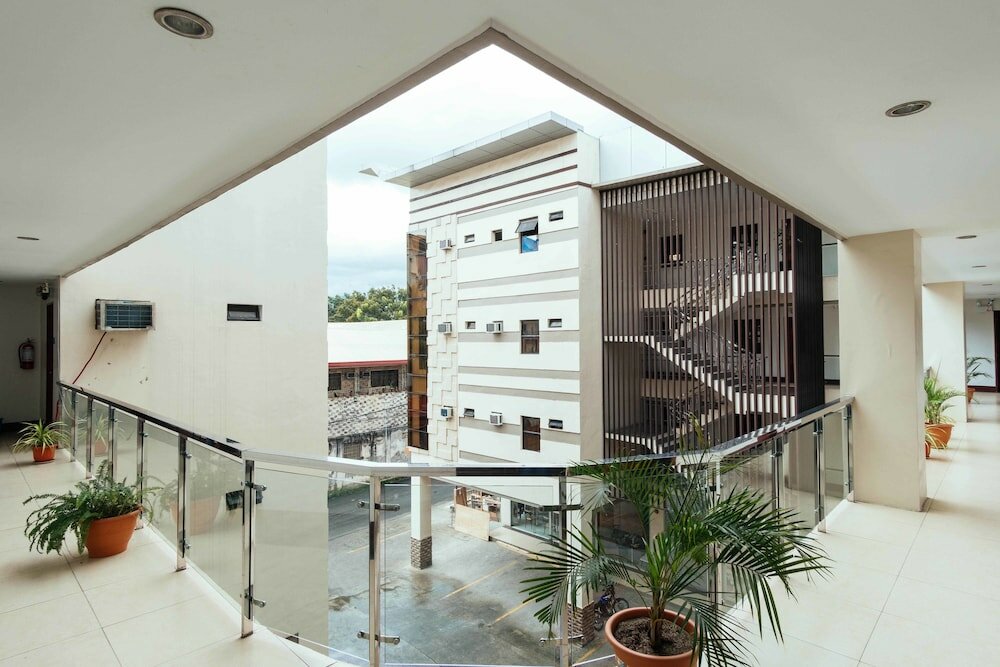 Фото Oyo 443 Maria Cristina Arcade Suites