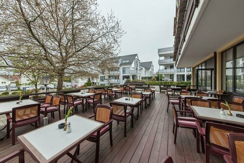 Гостиница Novum Hotel Strohgäu в Дитцингене